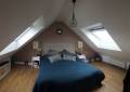 Rénovation d'une chambre sous les combles avec isolation thermique des murs intérieurs et installation de deux Velux