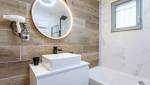 Rénovation complète d’une salle de bain à Sautron miroir