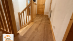 sol PVC imitation parquet, artisan pose sol PVC, La Maison des Travaux Moûtiers, moderniser intérieur maison, revêtement sol facile à entretenir