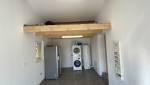 Aménagement garage en buanderie cellier La Maison Des Travaux Ales