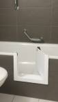 Baignoire avec découpe pour accès direct