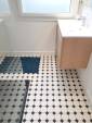 Pose d'un carrelage en carreaux noirs et blancs à Argentan
