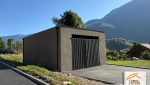 chantier bâtiment fissuré, garage reconstruit en dur, ravalement façade Albertville, coordination artisans locaux, rénovation Savoie durable