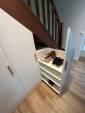 Meuble à chaussures dans un placard aménagé sous l'escalier - Nantes 44