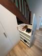 Meuble à chaussures dans un placard aménagé sous l'escalier - Nantes 44
