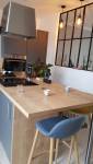  Rénovation d’une cuisine ouverte alliant charme et modernité à Montpellier