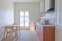 Travaux de rénovation energétique pour un appartement destiné à la location : remplacement de la porte-fenetre avec double vitrage haute isolation, isolation du mur par l'intérieur