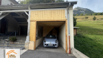 La Maison des Travaux Moûtiers, aménagement communal Savoie, escalier bois sur mesure, porte garage sécurisée, rénovation bâtiment Allondaz