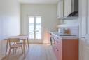 Travaux de rénovation energétique pour un appartement destiné à la location : remplacement de la porte-fenetre avec double vitrage haute isolation, isolation du mur par l'intérieur