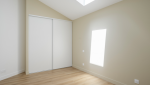 Surélévation d'une maison pour créer un commerce et deux logements à Vertou - Placard chambre