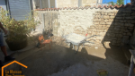 PENDANT Rénovation du muret en pierre à la chaux 