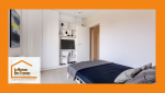 Chambre rénovée avec sobriété, murs lissés et teintes claires pour une ambiance apaisante et moderne.