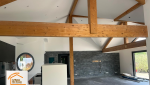 La Maison des Travaux Moûtiers, faux plafond isolé LED, agrandissement volume intérieur, poutres apparentes design, éclairage intégré plafond