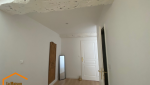 APRES Rénovation des murs et plafond avec finition peinte des poutres porteuses