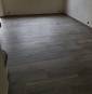 Ragréage et pose d'un nouvau carrelage dans une longère