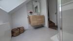 Salle de bain terminée – Un espace moderne sous les toits