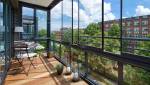 Loggia fermée tout en vitrage pour maximiser la luminosité - Paris Epinettes