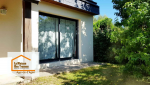 Rénovation à Brax : remplacement de menuiseries anciennes par une baie vitrée moderne en PVC double vitrage.