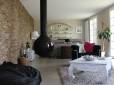 rénovation de maison Le Plessis-Robinson avec cheminée et mur de pierres