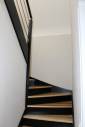 Installation d'un escalier déco noir et bois