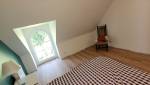 Chambre avec lucarne