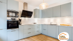 rénovation complète cuisine Gex, modernisation intérieur Pays de Gex, pose carrelage effet bois Valserhône, installation cuisine contemporaine Divonne-les-Bains, réfection plomberie Ferney