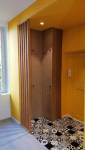 Vestiaire, mobilier et claustra sur nouveau carrelage d'entrée de maison à Crozon (29160)