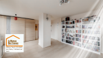 Séjour spacieux et lumineux modernisé avec parquet et peinture dans des tons doux à Dreux.