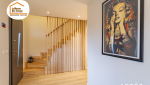 pose parquet Gex, escalier bois Pays de Gex, revêtement moderne Divonne-les-Bains, décoration chaleureuse Ferney-Voltaire, continuité visuelle Valserhône