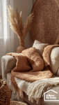 Ambiance intérieure chaleureuse : plaids, lumière, matériaux naturels
