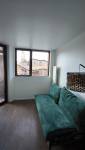 avoriaz-74110-renovation-appartement-sejour-canape-fenetre-porte-fenetre-balcon