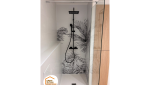 rénovation salle de bain Saint-Julien-en-Genevois, rénovation salle de bain 74160, salle de bain moderne Haute-Savoie, douche à l’italienne design, sol effet bois salle de bain, rénovation intérieure Bassin Genevois