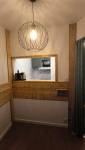 avoriaz-74110-renovation-appartement-sejour-passe-plat-ouverture-cuisine-boiseries
