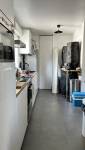 Cuisine rénovée après travaux rénovation d’appartement à Bruz par La Maison Des Travaux Bruz