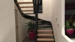 Escalier sans contremarches double quart tournant en pavillon bois et acier 