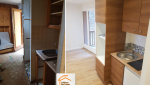 La Maison des Travaux Albertville, rénovation complète Méribel, optimisation m² appartement, faux plafond moderne, rénovation montagne premium, parquet stratifié qualité