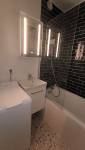  avoriaz-74110-renovation-appartement-salle-de-bain-vasque-miroir-led-baignoire