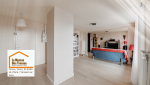 Rénovation d’un salon lumineux avec parquet clair et finitions soignées à Dreux et Anet. 