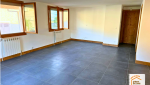  modernisation sol appartement, rénovation carrelage Haute-Savoie, artisan pose carrelage Chamonix, design intérieur contemporain, sol effet ardoise montagne, la maison des travaux chamonix