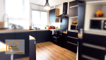 Cuisine rénovée à Quimper avec mobilier contemporain, plan de travail bois et agencement optimisé pour un confort quotidien et une meilleure circulation.