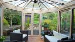 Création d’une véranda lumineuse ouverte sur le jardin à Besné 1