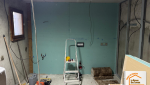rénovation intérieure Mercury, création salle de bains studio, isolation électricité plomberie, aménagement mezzanine Savoie, habillage bois mural
