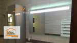Miroir LED rétroéclairé avec éclairage homogène et économe en énergie, parfait pour une ambiance douce et élégante.