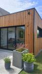 Extension bois vs extension maçonnée : quel choix pour agrandir sa maison ?