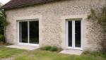 ouverture dans un mur en pierre et  pose de menuiseries à Touques