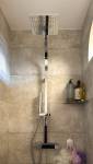 Douche à l'italienne avec arche d'ouverture 
