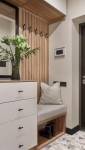 Un dressing, des tiroirs et un banc pour une entrée chic et pratique