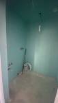 Transformation d'un dressing en salle de douche parentale 