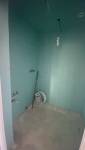 Transformation d'un dressing en salle de douche parentale 