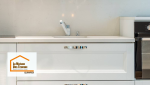 Détail d’un meuble bas dans cette rénovation de cuisine à Pont-l’Abbé : finitions soignées, poignées modernes et rangements pratiques.